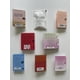 thumbnail image 5 of Conjunto de Muestras de Perfume Edición Limitada Infinite Scents para Mujeres (8 Frascos de Fragancias de Diseñador) con Bolsa de Regalo de Cuerda Navideña, 5 of 5
