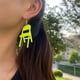 thumbnail image 4 of Xihbxyly Pendientes de Silla Plegable, Joyería Miniatura Única, Collar Deportivo Llamativo, Diseño Acrílico Duradero, Apoya La Igualdad y La Resiliencia, Ideal para Activistas y Políticos, Incluye Un, 4 of 4