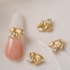 thumbnail image 5 of 10 adornos para uñas de conejo 3D con diamantes de imitación y purpurina giratorios., 5 of 5