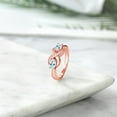 thumbnail image 4 of Gem Stone King 18K Rose Gold Plated Silver Sky Blue Topaz and Created Sapphire Infinity Love Knot Ring for Women | 1.11 Cttw | Oval 6X4MM | Gemstone Birthstone | Jewelry Gifts for Mom Wife | Size 5, 4 of 5