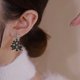 thumbnail image 4 of Pendientes de borlas de árbol de Navidad coloridos europeos y americanos para mujer, dulces pendientes de Navidad largos con decoraciones navideñas huecas y estrellas, 4 of 5
