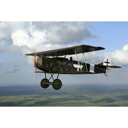 Fokker DVII World War I replica fighter in the air Stretched Canvas - Daniel KarlssonStocktrek Images (35 x