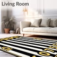 thumbnail image 2 of ODIKA 6'x9' Machine Washable Non-Slip Area Rug, Vintage Sports Ticket with Dynamic Stripe Accents High Traffic Rug with Pad, Black, 669510, 2 of 8
