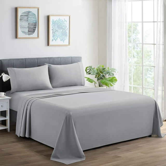 Silver Marina Decoration 600 thread count ultra soft deep pocket percale cotton sheet set on bed with matching pillowcases in modern bedroom.