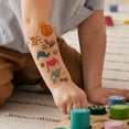thumbnail image 2 of Wrapables Waterproof Temporary Tattoos for Children, 20 sheets, Dinosaurs & Animals, 2 of 9