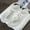 White, variant on Jelly Sandals for Women Flat Flip Flops with Adjustable Buckle Strap Flower T-Strap Slipper