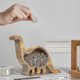 thumbnail image 1 of Alcancía de madera con forma de dinosaurio, caja para ahorrar dinero, regalo para niños, decoración del hogar, 1 pieza, color madera, 1 of 4