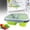 Green, variant on Yooci grey Silicone Foldable Lunch Box on Table, Space-saving Leak-proof Versatile Collapsible Bento Box