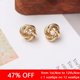 thumbnail image 3 of Pendientes pequeños de Metal para mujer, aretes redondos retorcidos de Color dorado, pequeños e inusuales, joyería de moda, 3 of 4
