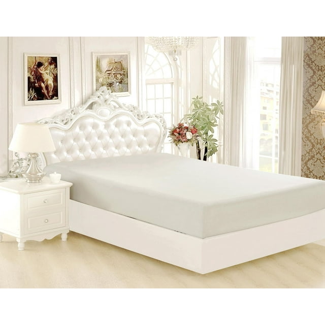 Silver Marina Decoration ultra soft silky bamboo rayon deep pocket fitted sheet on white bed with tufted headboard in elegant bedroom.