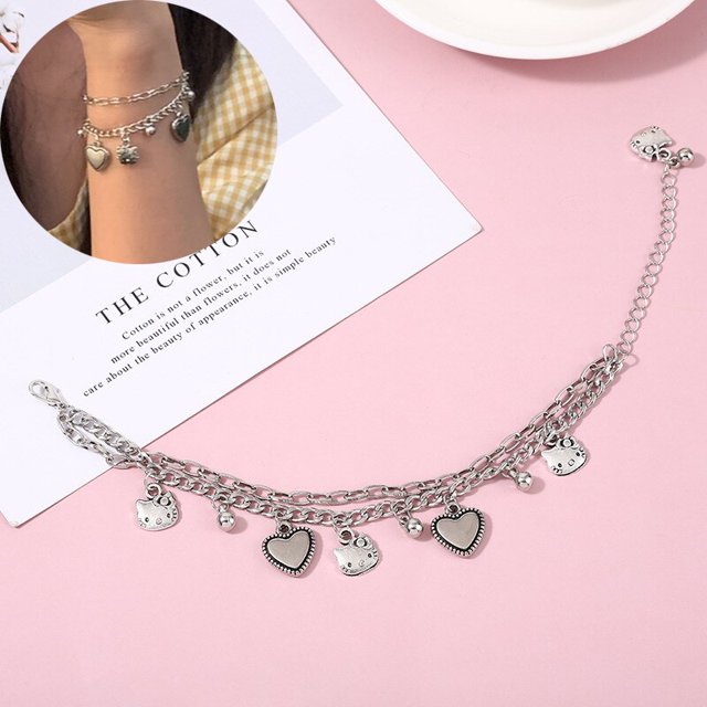 Sanrio Anime My Melody Kuromi linda pareja de dibujos animados pulsera imán bola mano hombres mujeres regalo niñas Kawaii banda de goma regalos Juguetes Dengxun unisex