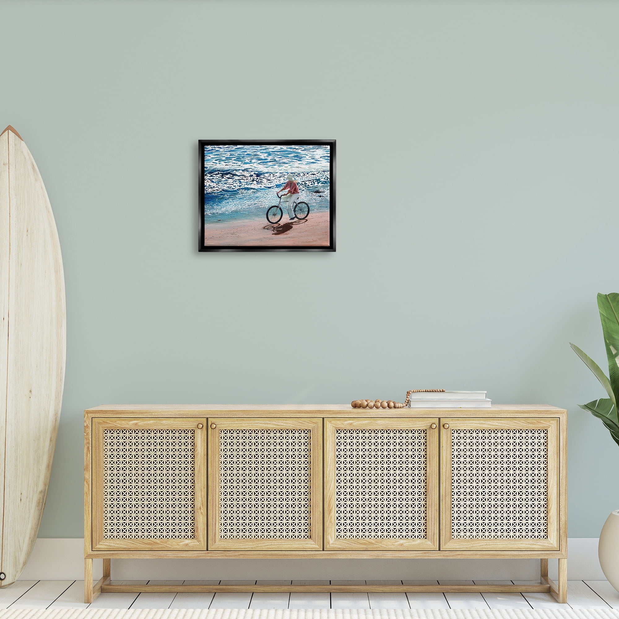 Stupell Industries Woman Riding Bicycle Coastal Beach Shoreline Landscape Painting Jet Black Floating Framed Canvas Print Wall Art, Design by Tom Mielko