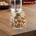 thumbnail image 1 of Rotating acrylic ornament featuring a crystal bee surrounded by vibrant flowers and honeycombs in rich yellow to dark brown hues with intricate details, 1 of 8