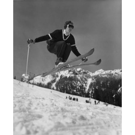 Low angle view of young man skiing downhill Canvas Art - (24 x 36)