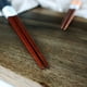 thumbnail image 3 of Juego de Palillos Japoneses de Madera de Castaño, Acabado Natural, Elegante Par de Regalo, Material Sostenible, 23,5 Cm de Largo, Elegantes Artículos Esenciales para La Mesa., 3 of 5