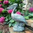 Homestyles 20 in. Bronze Patina Pelican on Coastal Rock Nautical Beach