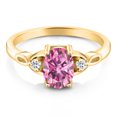 thumbnail image 2 of Gem Stone King 18K Yellow Gold Plated Silver Pink Moissanite and White Topaz 3-Stone Rings for Women (1.46 Cttw, Gemstone, Oval 8X6MM, Available in Size 5, 6, 7, 8, 9), 2 of 4