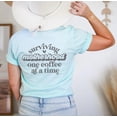 thumbnail image 3 of SURVIVING MOTHERHOOD ONE COFFEE AT A TIME Graphic Plus Short sleeve T-Shirt, 3 of 11