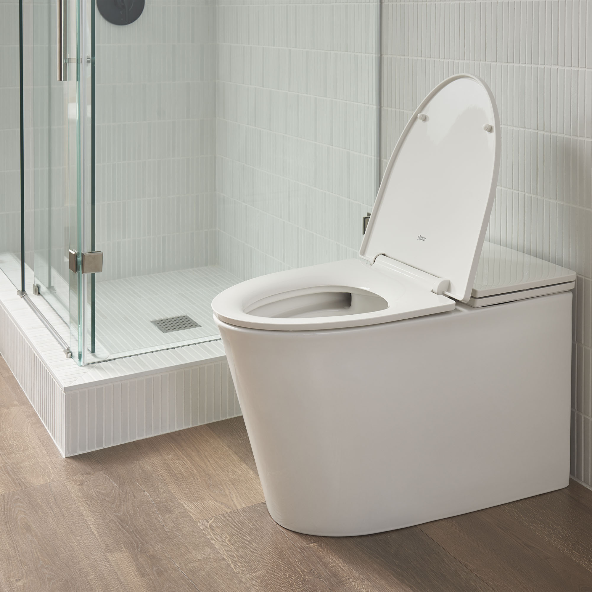 American Standard Studio S 1-piece 1.0 GPF White Elongated Low-Profile Toilet, Seat Included - image 10 of 14