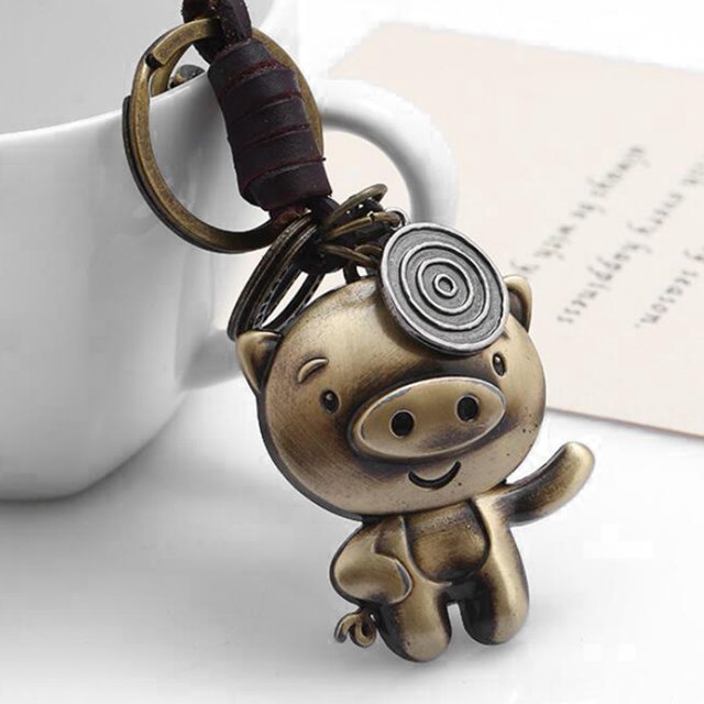 Animales de dibujos animados forma de cuero tejido a mano llavero colgante bolsa de decoración (estilo 3)