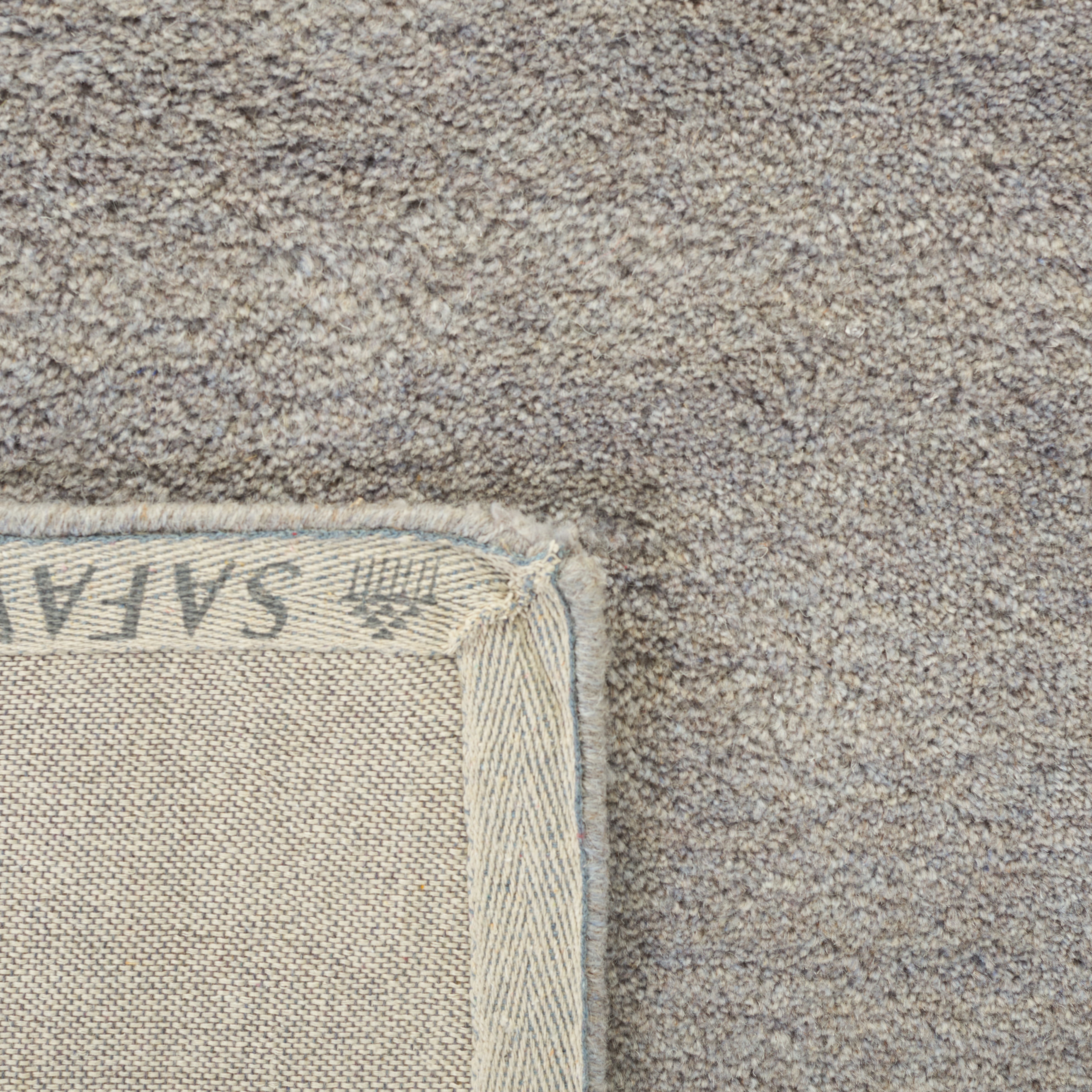 SAFAVIEH Himalaya Rachelle Solid Wool Area Rug, Grey, 8' x 10'