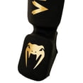 thumbnail image 3 of Espinilleras Venum Kontact negro/dorado talla S 100% algodón, 3 of 3