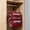 Red, variant on 4 Tier Luggage Organizer With Mesh Compartments & Zipper Portable Hanging Travel Storage Shelf With Hooks For Sport Outdoor Home(Red-50Cm)