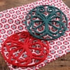 The Pioneer Woman Timeless Beauty 2-Pack 8" Red & Ocean Teal Enameled Cast Iron Trivet Set