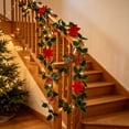 thumbnail image 5 of Christmas Holly Garland with Poinsettia, 6.56ft Flexible Vine Garland with Green Leaves, Realistic Faux Greenery Hanging Decor for Fireplace, Wall, Staircase & Holiday, 5 of 6