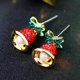 thumbnail image 2 of Pendientes de alce de cristal rojo con forma de gorro de Papá Noel asimétrico, mariposa y campana, 2 of 4