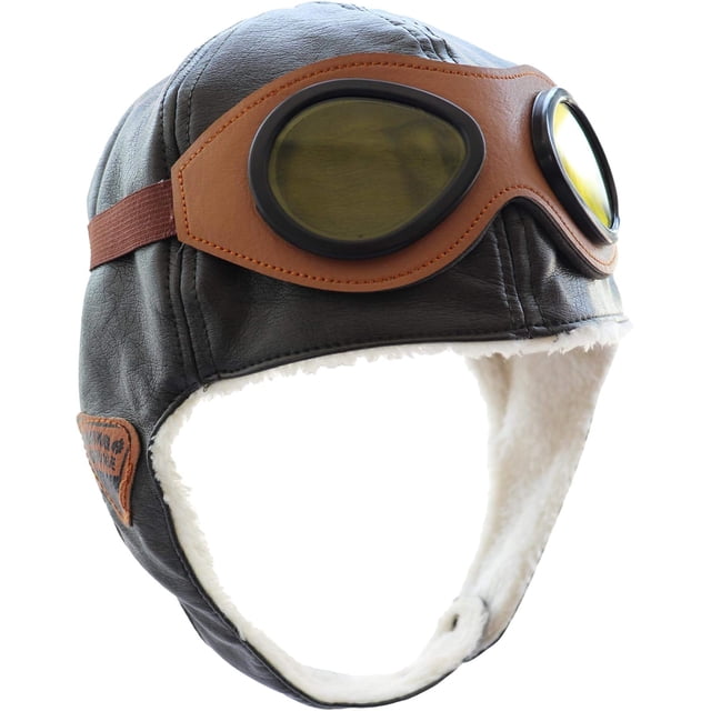 pilot aviator fleece warm hat cap with earmuffs for kids toddlers Café by Promoverip, front‑three quarter view showing brown faux‑leather shell, tan PU goggle panel with amber lenses, white plush fleece ear lining and chin strap; fits 2–6 años, suitable as a photo prop for children's costume shoots.