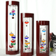 thumbnail image 4 of Termómetro Galileo de vidrio, un diseño con esferas multicolores en un marco de madera con acabado de cerezo, 4 of 5