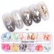 thumbnail image 1 of Lentejuelas de brillo de uñas hexagonales mixtas iridiscentes Holo copos de polvo para decoración de uñas esmalte de Gel Paillette accesorios de manicura LADJ01-12-2 Tan Jianjun unisex, 1 of 2