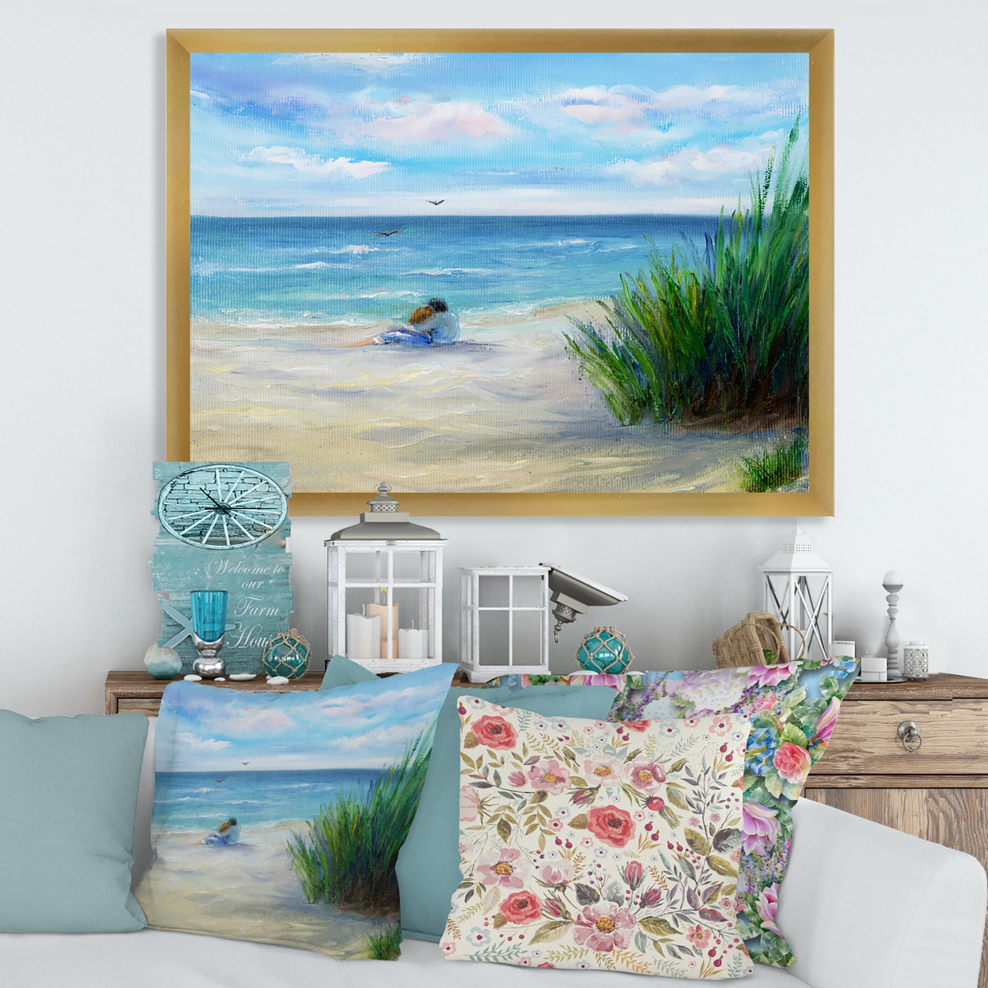 Designart 'Couple Sitting In Love By The Beach' Nautical & Coastal Framed Art Print