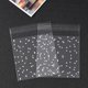 thumbnail image 2 of Bolsas de plástico transparentes de celofán para dulces, bolsas autoadhesivas de lunares blancos, para regalo de galletas, boda, fiesta de cumpleaños, 100 piezas, 2 of 4