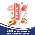 thumbnail image 3 of Bálsamo labial Nivea - Melocotón con brillo afrutado - Paquete de 1, 3 of 8