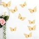 thumbnail image 4 of Pegatinas de Pared de Mariposas: 12 Piezas de Mariposas Doradas Decorativas, Ideales para Cumpleaños y Fiestas. Pegatinas Extraíbles., 4 of 7