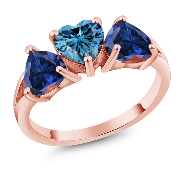 Gem Stone King 18K Rose Gold Plated Silver 3-Stone Ring Heart Shape Persian Blue Moissanite and Created Sapphire Blue (2.40 Cttw, Size 6)