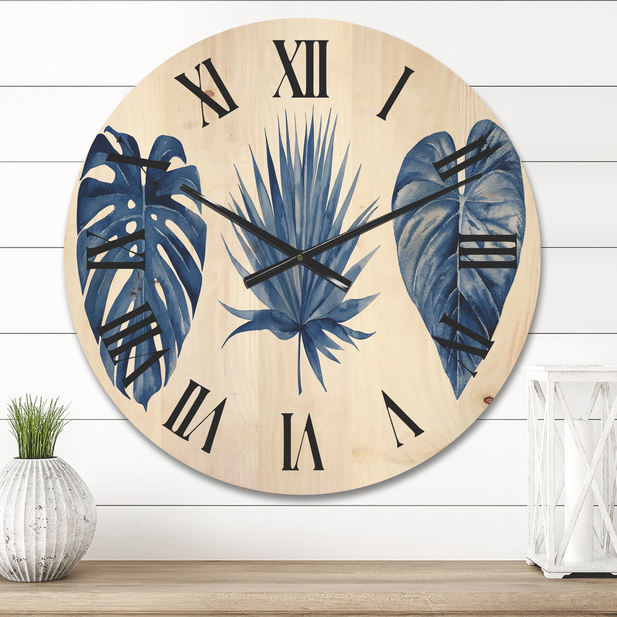 Designart 'Tropical Leaves In Classic Blue ' Tropical Wood Wall Clock