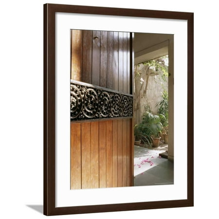 Decorating Ideas For Front Door A Modern Front Door Decorated with a 400 Year Old Piece of Wood Carving Framed Print Wall Art By John Henry Claude Wilson ()