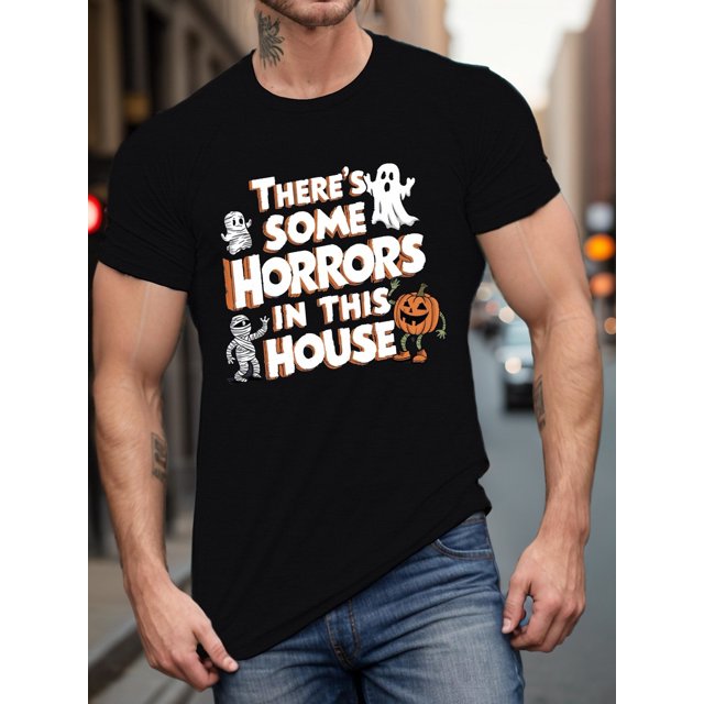 Camiseta de Halloween: Diseño aterrador "Hay algo de terror en esta casa" con esqueletos, momias y calabazas. Camiseta informal de manga corta.