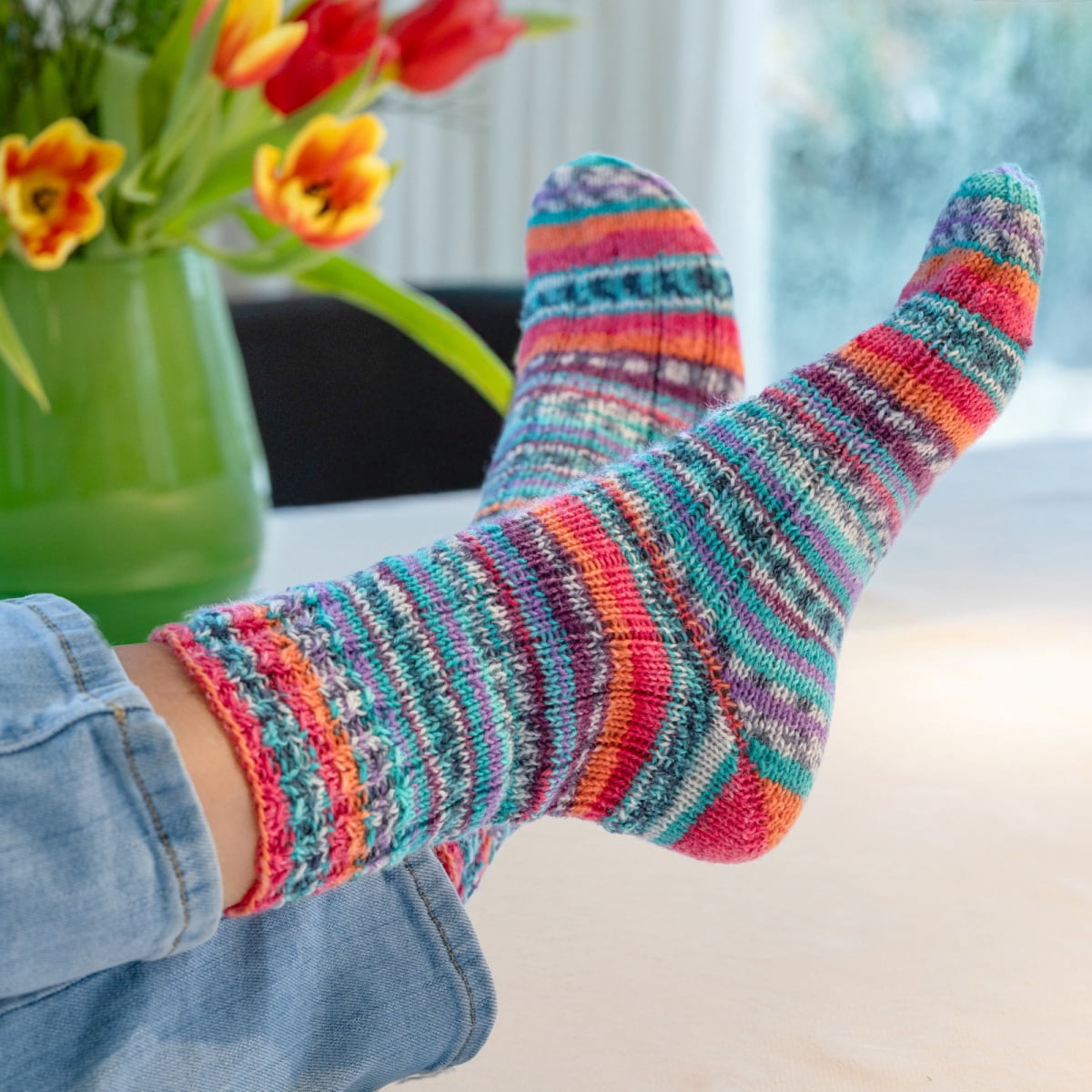 Grundl - Hot Socks Campione 4ply yarn, 100 g | 460 yards | 75% Virgin Wool Superwash, 25% Polyamide | Color 03 - Moss-Aqua-Orange-Sea-White-Black