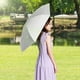 thumbnail image 1 of Paraguas plegable ultraligero | Paraguas compacto de bolsillo para mujer | Protección solar y contra la lluvia | Sombrilla pequeña de viaje resistente a la intemperie para días soleados y lluviosos, 1 of 6