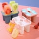 thumbnail image 1 of Moldes de Plástico Azul Aptos para Alimentos para Helados con Tapa | 4 Cavidades | 12 X 7 X 7 Cm | Molde para Paletas Caseras | Resistente a Bajas Temperaturas, 1 of 6