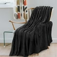 thumbnail image 4 of PAVILIA Soft Fleece Solid Black Throw Blanket for Couch, Lightweight Plush Warm Blankets for Bed, Fuzzy Cozy Flannel Blanket Throw for Sofa, Travel, Jacquard Pattern, Black, Twin, 60x80 inch, 4 of 8