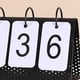 thumbnail image 4 of Soporte de Metal para Calendario de Escritorio - Elegante Accesorio de Oficina, 4 of 5