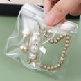 thumbnail image 4 of Jewelry Organizer Transparent Jewelry Storage Book Bag Travel Clear Jewelry Holder Bag with 96 Grids and 96 Thicken PVC Jewelry Storage Display Bag for Earring Bracelets Necklace Rings, 4 of 10