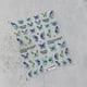 thumbnail image 4 of Pegatina acrílica grabada para uñas, diseño de mariposa verde y azul, deslizadores de transferencia de uñas autoadhesivos, envolturas para manicura, láminas Z0670, 4 of 4