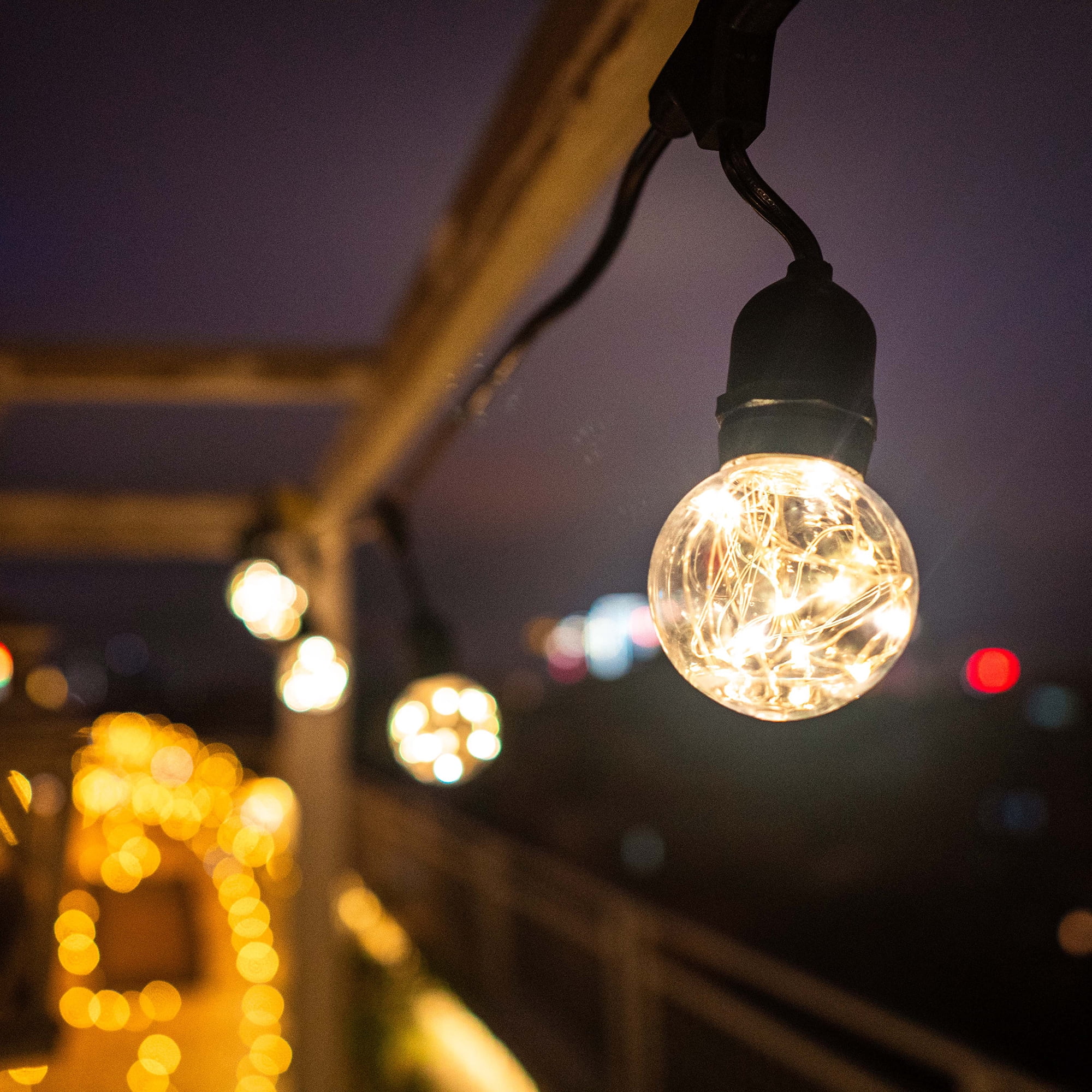 Better Homes & Gardens 110 Volts Electric 14.8 feet 10 Count G60 Clear Plastic Bulbs Black Wire LED String Lights for Outdoor and Indoor Use