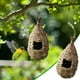 thumbnail image 1 of Fiudx Liquidación navideña Casa de colibrí tejida a mano, nidos de pájaros creativos, hibisco, simulación de césped, casa de pájaros, decoración colgante de jardinería, 1 of 7